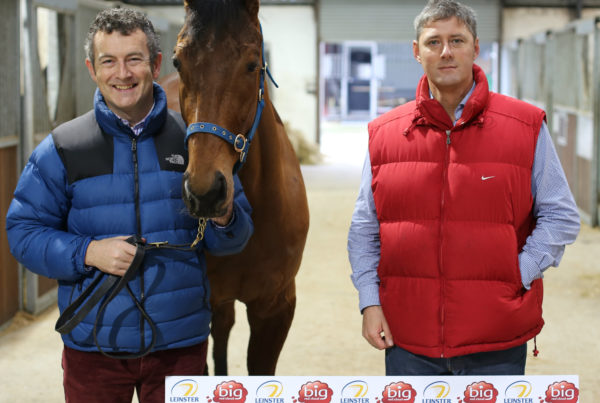 2 men with a horse